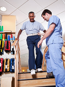 Physical therapy patient with physical therapist